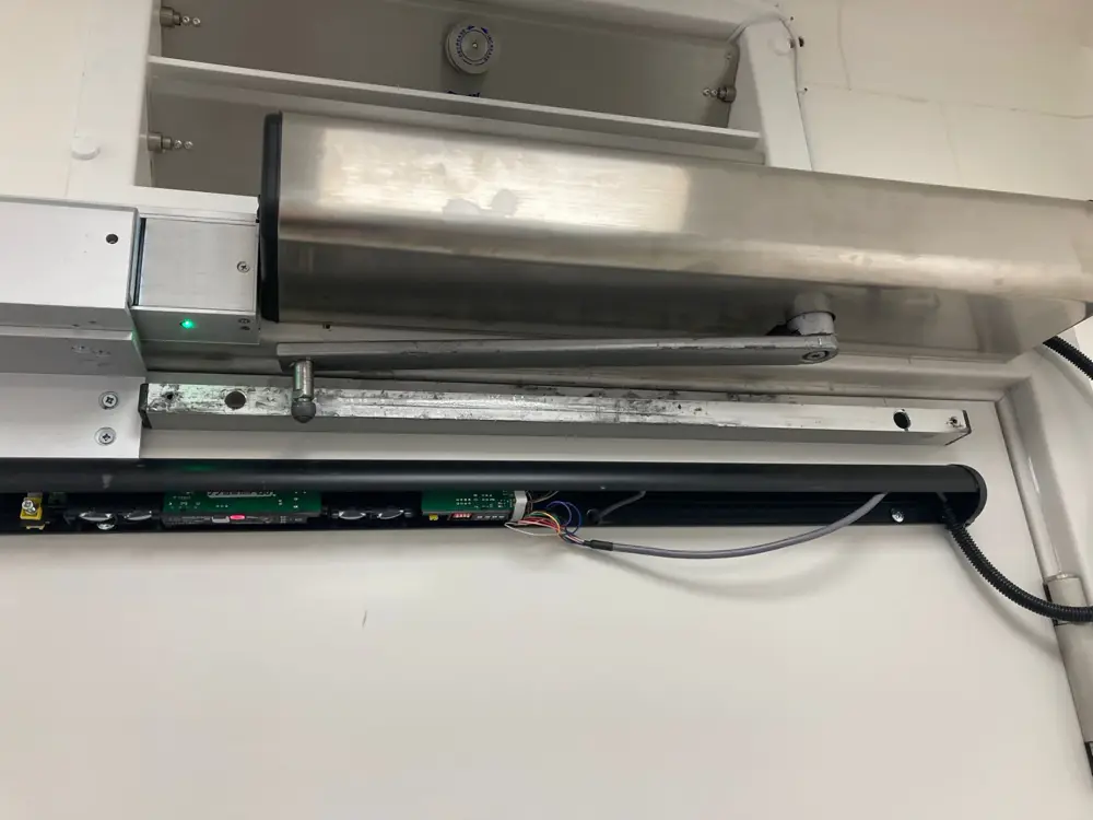 Radiography Auto Door Repair, Windsor — <div class="projSlider-overlay">
              <span class="projSlider-tag">Radiography Auto Door Repair, Windsor</span>
              <h3 class="projSlider-name">Auto door repair and realigned installation</h3>